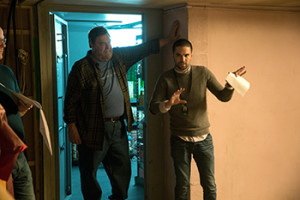 (L-R) John Goodman and director Dan Trachtenberg on the set of 10 CLOVERFIELD LANE, by Paramount Pictures